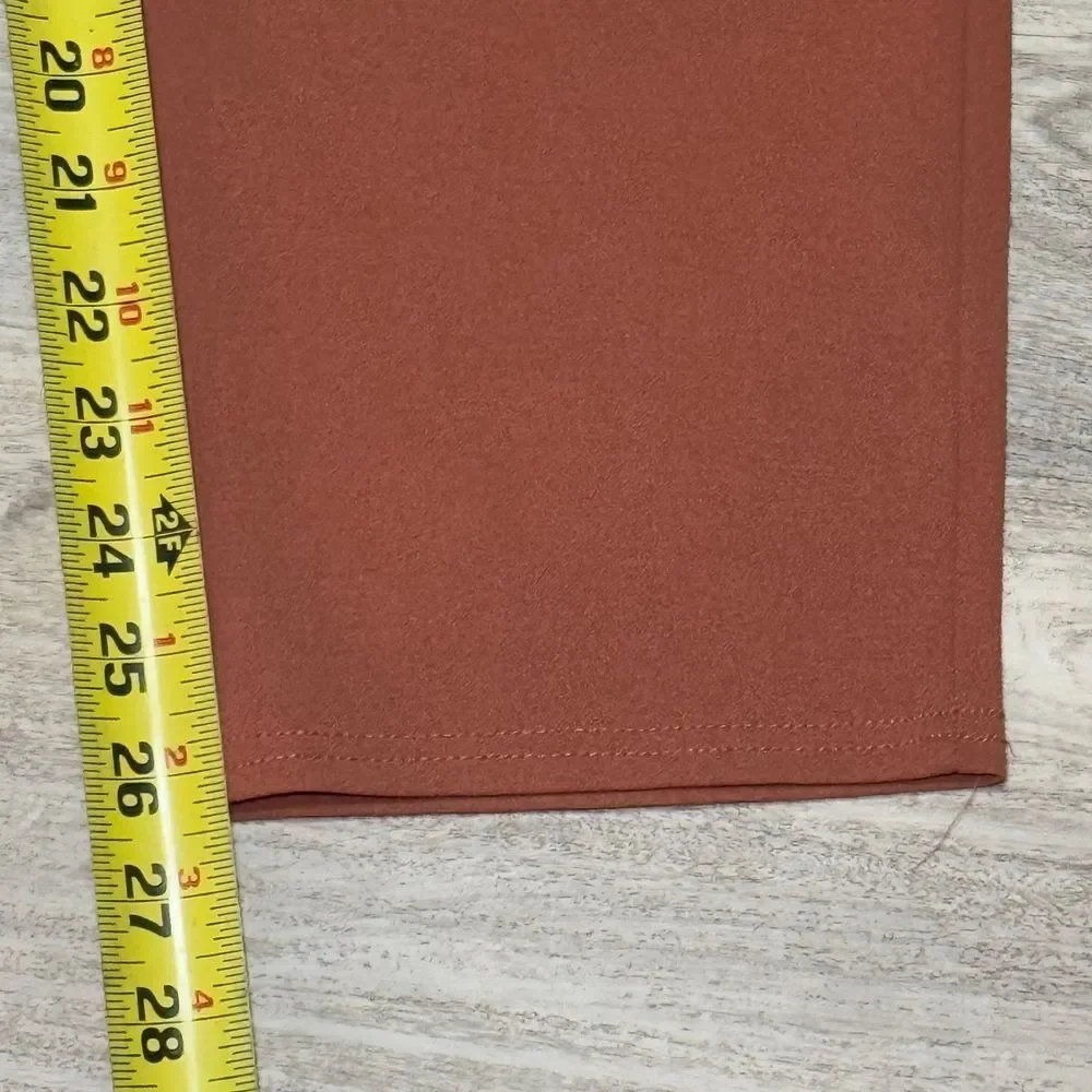 Soho Apperal brownish office pants size large 28 waist 26 length. In great condi
